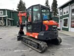 2026 Kubota KX057-5  includes heat, A/C, angle blade, 2X AUX hydraulics, coupler, hydraulic thumb, dig bucket - Image 4